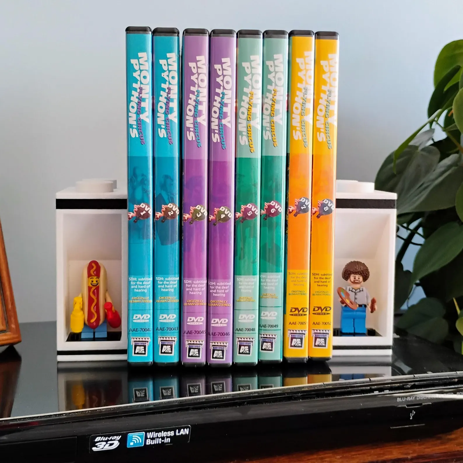 LEGO® minifigure bookend used as a DVD shelf stop. Perfect fit for LEGO® fans who want organized media displays with a collectible twist.