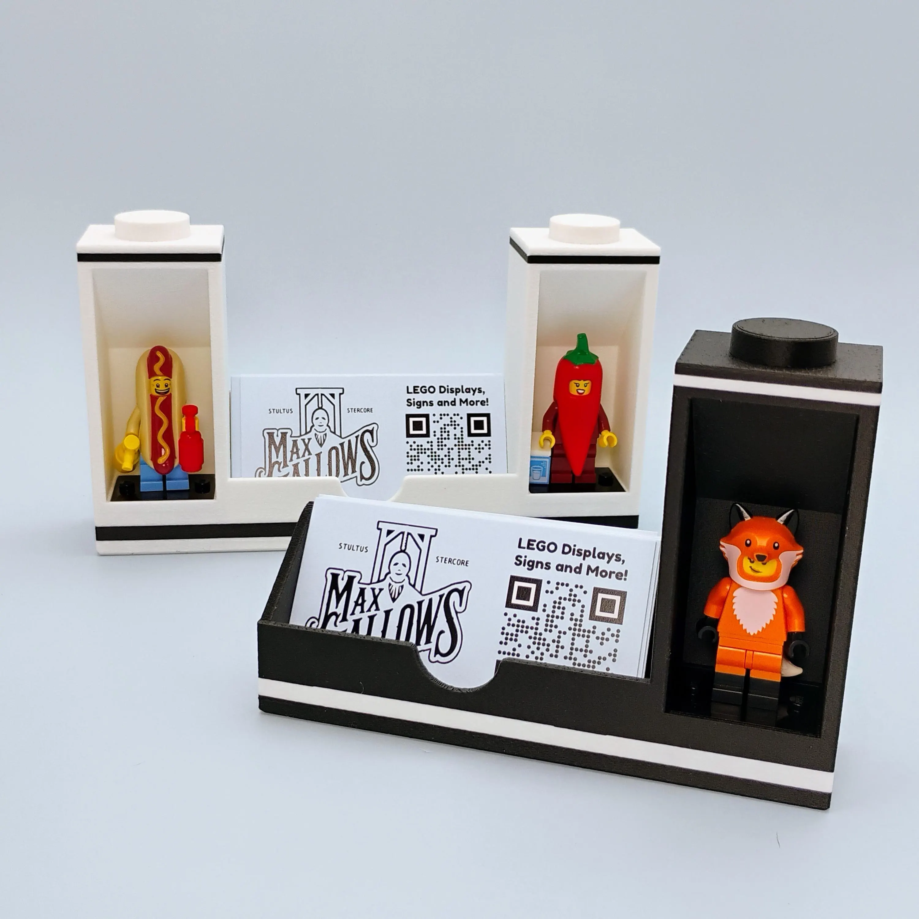 LEGO® minifigure business card holder display in matte black and white with a clean modular design. Desk organizer and display stand for collectors, offices, and maker studios.