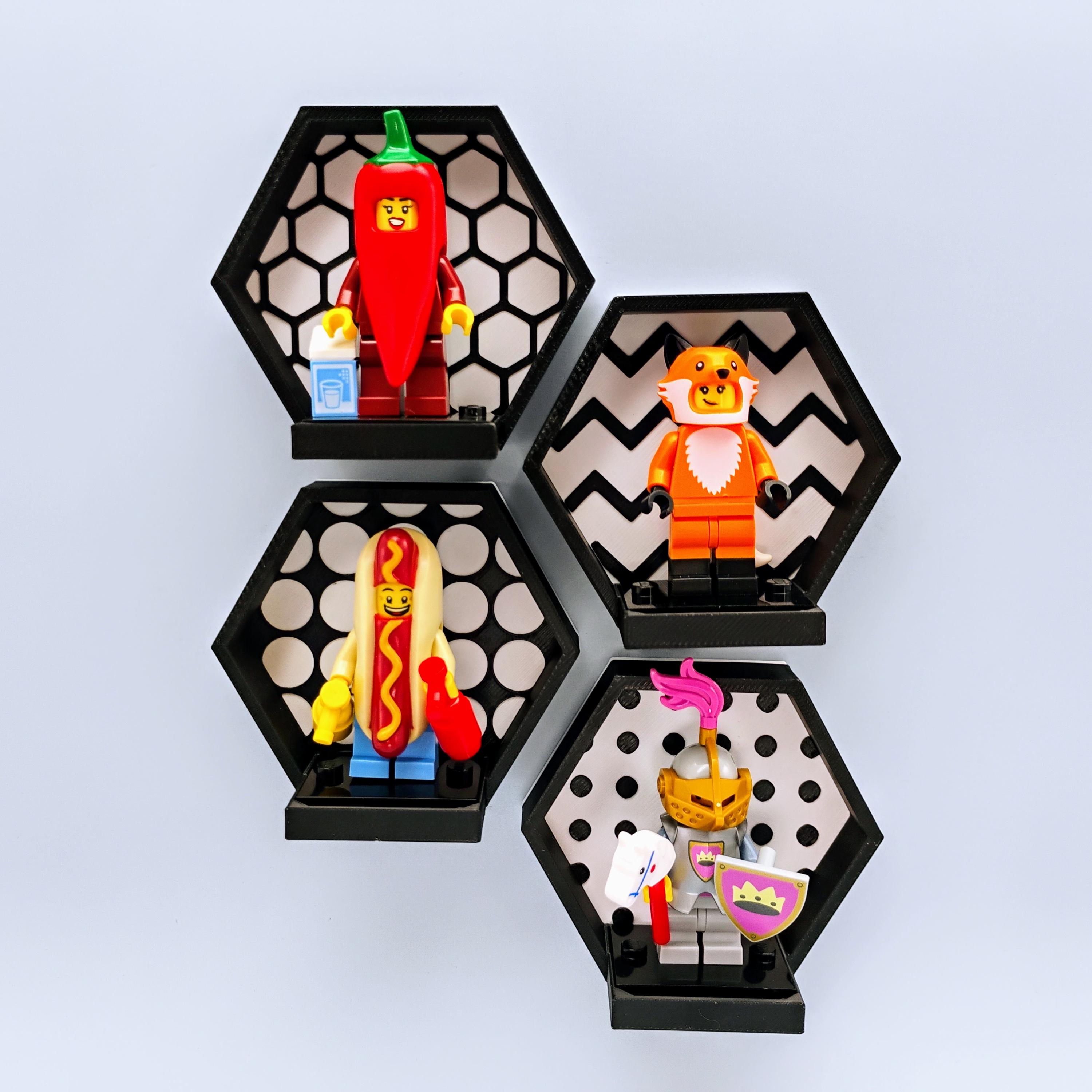 Black and white LEGO® magnetic hexagon displays showing pattern options: studs, zig-zags, hexagons, and circles. Clean modular wall display for collectors.