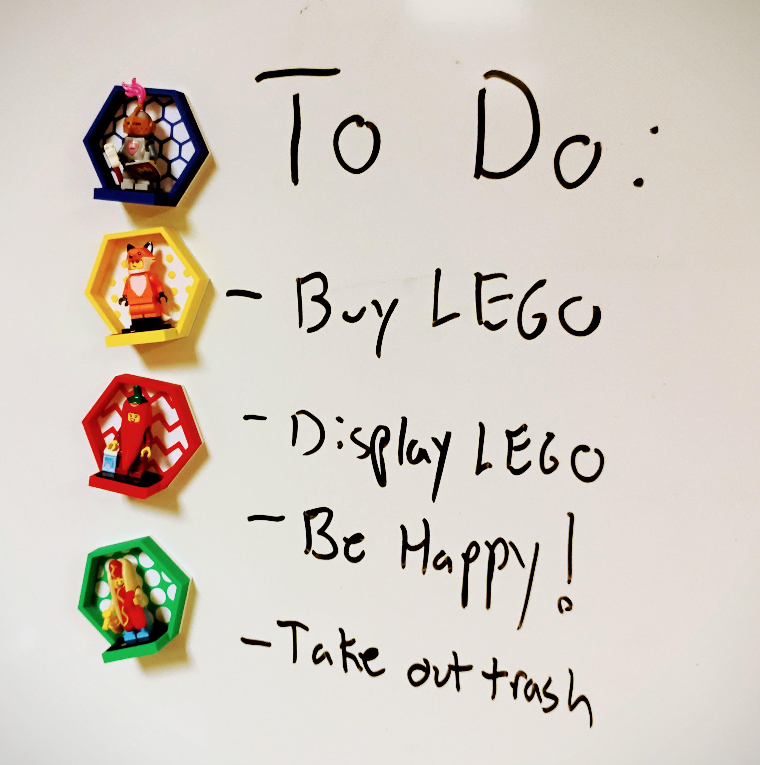 Fun LEGO® magnetic minifigure display board setup near whiteboard notes and creative workspace. Ideal collector gift and desktop decoration for LEGO® lovers.