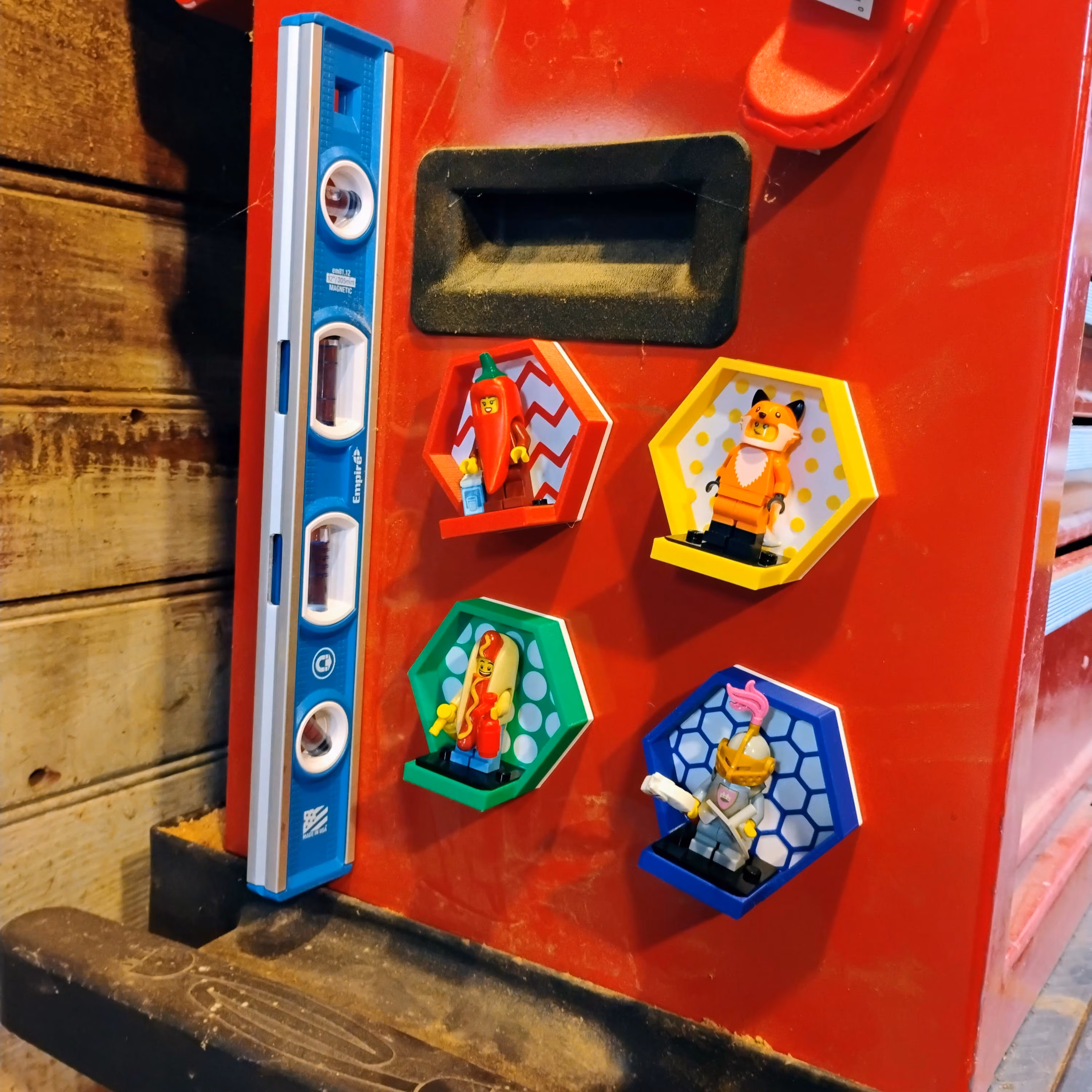 LEGO® magnetic minifigure display setup in a toolbox, showcasing organization and creativity. Perfect for collectors and builders.