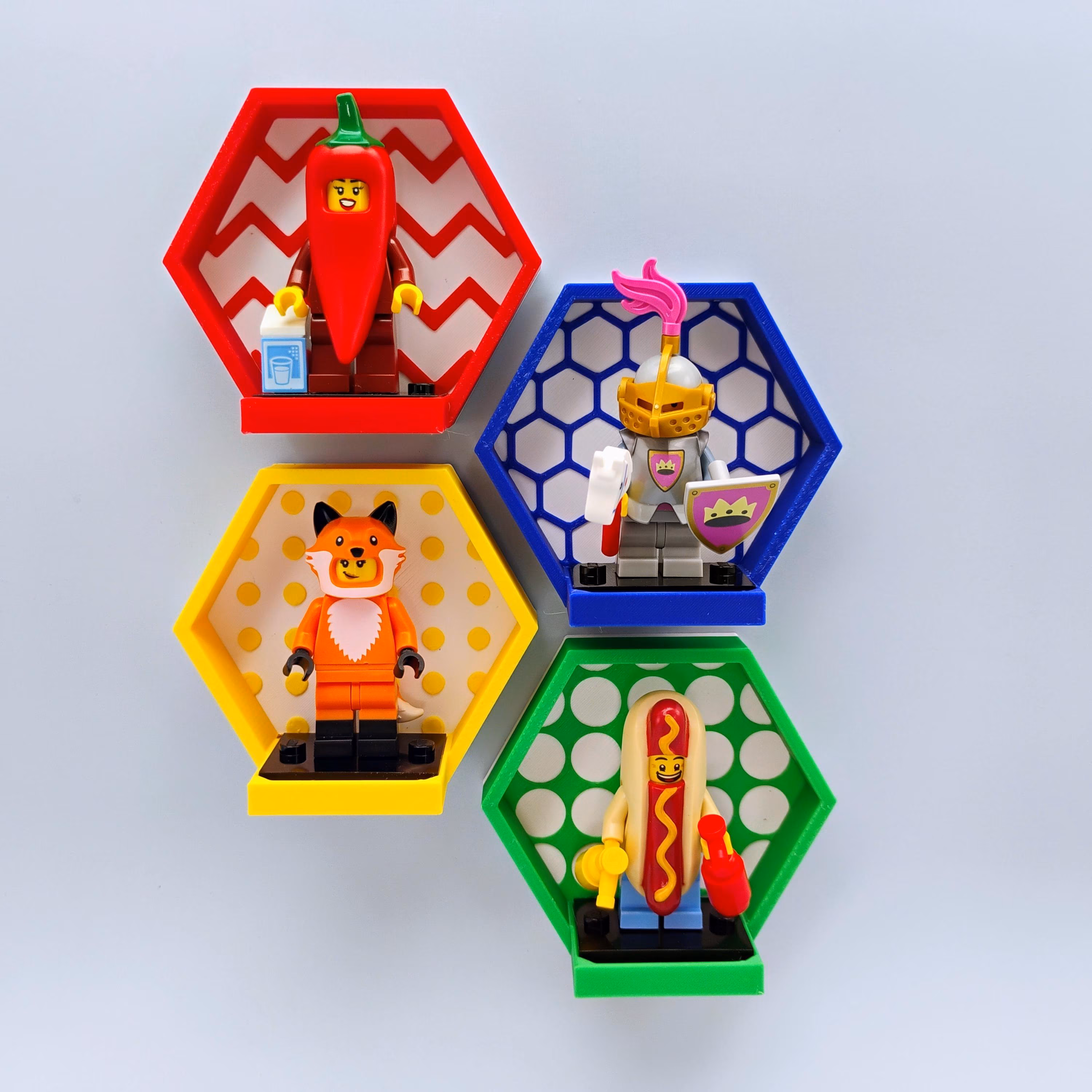 Magnetic LEGO® minifigure display mounts with colorful hexagon frames. Fridge-ready minifigure displays for collectors, AFOL displays, and home decor ideas with strong magnets.