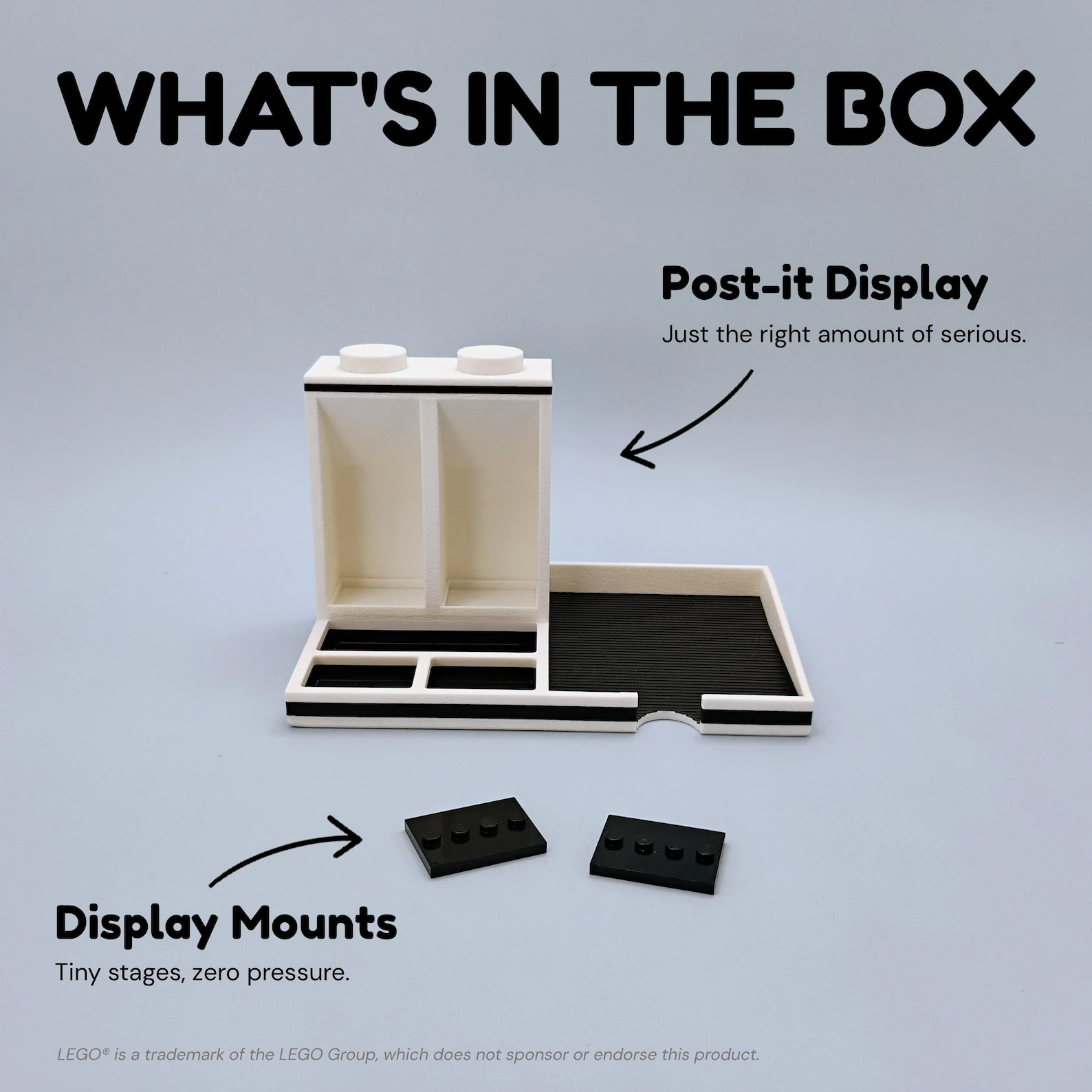 What is included with the LEGO minifigure desk organizer and Post-it holder. Shows the organizer body and all included display components so buyers can clearly see what arrives in the box.